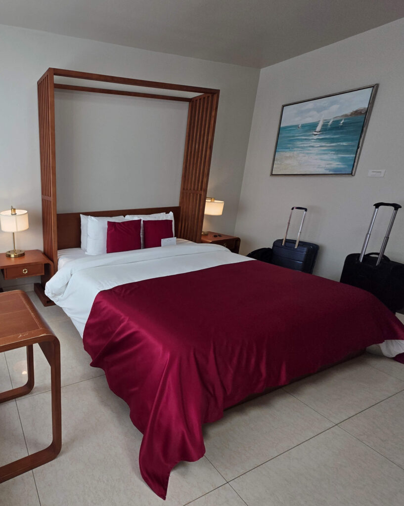 King Size Bed at Golden Bay Hotel in Belize City